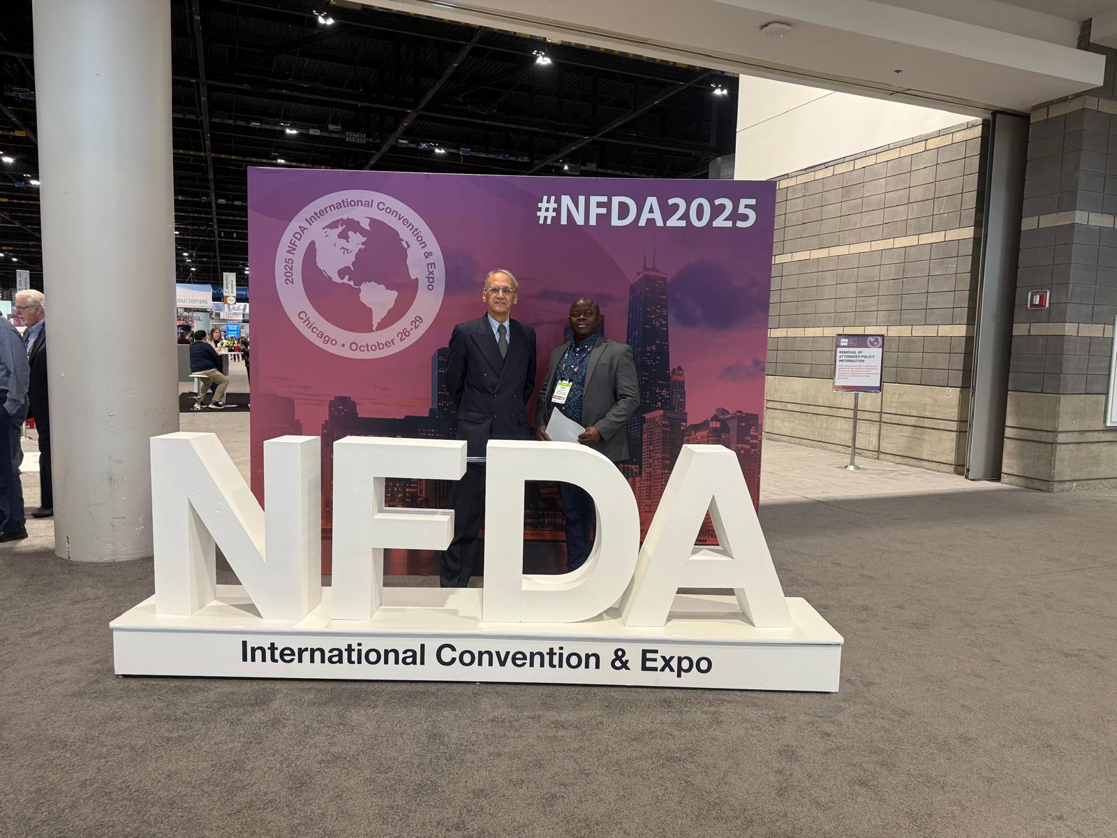 CEO Enos Atito with partner at NFDA 2025